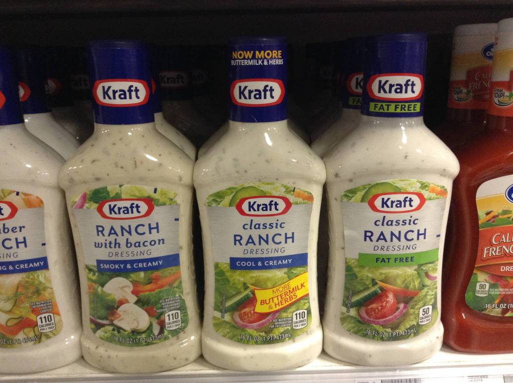 This photo available under a Creative Commons license shows several bottles of ranch dressing. Geoff Kirsch notes traditional ranch is quintessentially American, like baseball, jazz and the 64-ounce Double Big Gulp. (Mike Mozart / Flickr)