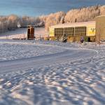 Courtesy Photo / Ned Rozell 
December sunshine lights a freshly groomed cross-country ski trail and the Student Recreation Center at the University of Alaska Fairbanks.