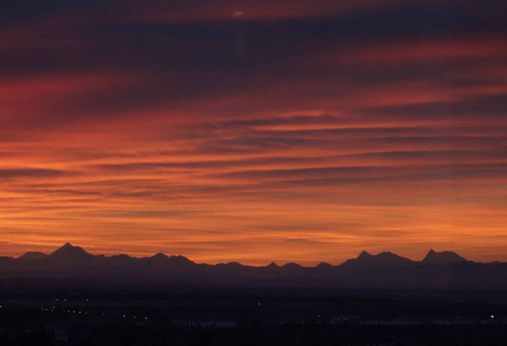 he Alaska Range sits beneath a December sunrise as seen from the UAF campus. (Courtesy Photo / Ned Rozell)