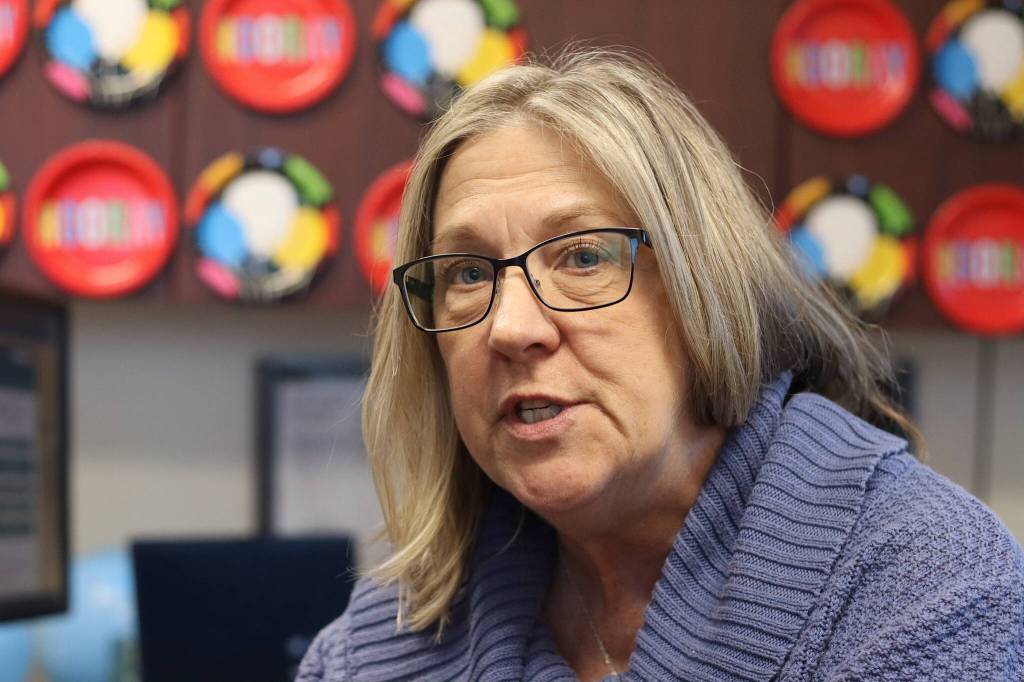 Gail Fenumiai talks about some of Alaskas most unusual elections on Friday, her last day as director of the state Division of Elections in Juneau after a 20-year career with the division. Behind her are congratulatory and farewell plates covering the walls, while her floor was strewn with a balloon drop from well-wishers before she arrived. (Mark Sabbatini / Juneau Empire)