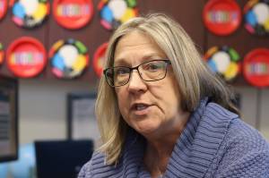 Gail Fenumiai talks about some of Alaskas most unusual elections on Friday, her last day as director of the state Division of Elections in Juneau after a 20-year career with the division. Behind her are congratulatory and farewell plates covering the walls, while her floor was strewn with a balloon drop from well-wishers before she arrived. (Mark Sabbatini / Juneau Empire)