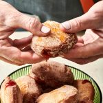 A plate of jelly doughnuts are displayed in New York on Nov. 15, 2021. In Jewish homes, jelly doughnuts are often enjoyed during Hanukkah and are known as Sufganiyot. (Cheyenne Cohen via AP)