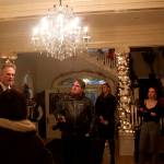 Gov. Mike Dunleavy answers media questions about his proposed budget for next year and the upcoming legislative session shortly before the annual holiday open house at the governors mansion on Tuesday. (Mark Sabbatini / Juneau Empire)