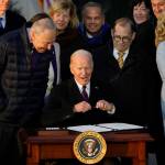 President Joe Biden signs the Respect for Marriage Act, Tuesday, Dec. 13, 2022, on the South Lawn of the White House in Washington. (AP Photo / Andrew Harnik)