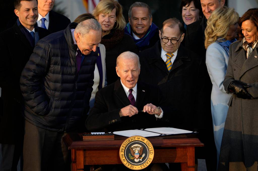 President Joe Biden signs the Respect for Marriage Act, Tuesday, Dec. 13, 2022, on the South Lawn of the White House in Washington. (AP Photo / Andrew Harnik)