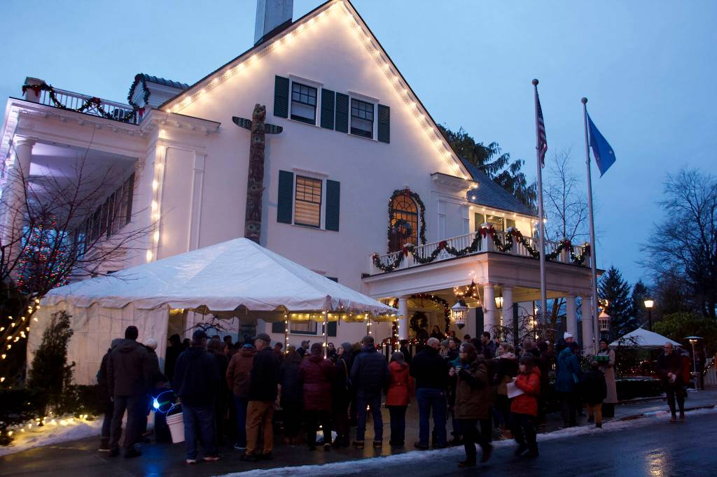 People line up outside the governor’s mansion on Tuesday for the annual holiday open house. The weather was seasonably cool, but without the heavy wind and precipitation of a day earlier. (Mark Sabbatini / Juneau Empire)
