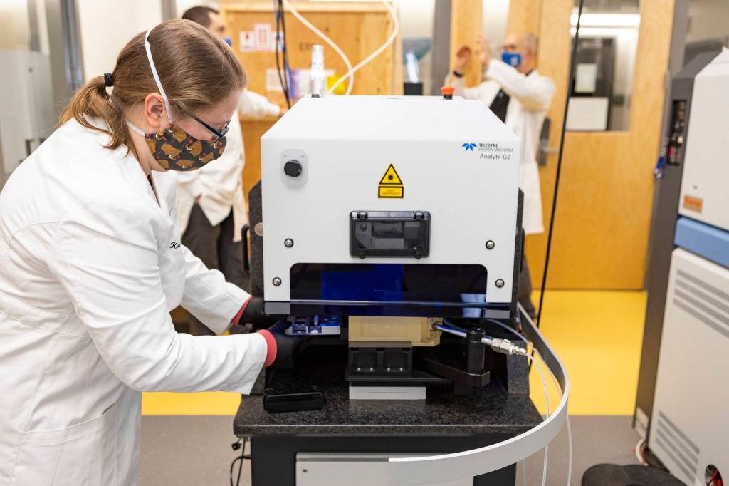 Karen Spaleta UAF loading a segment of mammoth tusk for analysis at the Alaska Stable Isotope Facility. (Courtesy Photo / Matthew Wooller)