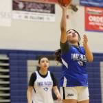 Ben Hohenstatt / Juneau Empire
Kiara Kookesh goes up for a layup while her teammate Addison Wilson looks on. Kookesh, a senior, will be a key contributor for the TMHS girls basketball team this year. Coach Andy Lee spoke highly of her defensive prowess in the face of tough assignments.