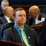 FILE - Alaska state Rep. David Eastman, R-Wasilla, sits in the House on April 29, 2022, in Juneau, Alaska. Eastman, accused of violating the state constitution's disloyalty clause over his lifetime membership in Oath Keepers, has not condemned the organization in the wake of the Jan. 6, 2021, insurrection at the U.S Capitol. "No, I generally don't condemn groups," Eastman, a Wasilla Republican, said during his bench hearing on Thursday, Dec. 15, 2022, his second day on the witness stand. (AP Photo / Becky Bohrer)