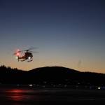 A helicopter with Santa Claus on board makes its way toward Juneau International Airport. (Clarise Larson / Juneau Empire)