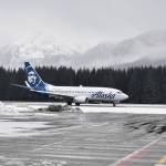 An Alaska Airlines flight lands at the Juneau International Airport. The National Weather Service has issued a winter storm watch for much many parts of the country from Thursday through Saturday. (Peter Segall / Juneau Empire File)