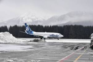 An Alaska Airlines flight lands at the Juneau International Airport. The National Weather Service has issued a winter storm watch for much many parts of the country from Thursday through Saturday. (Peter Segall / Juneau Empire File)