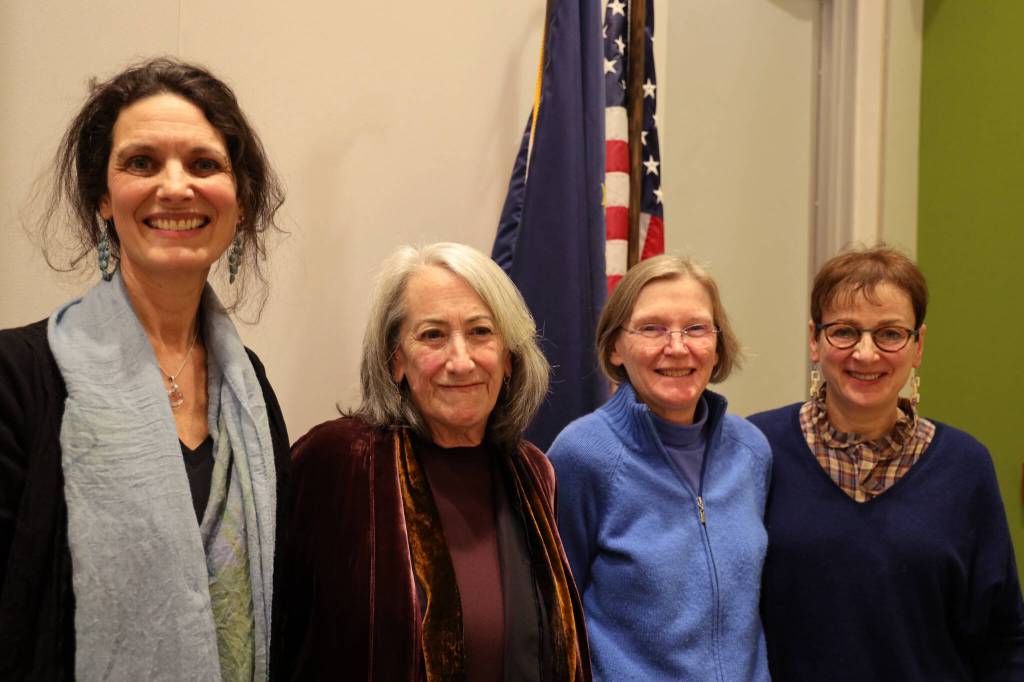 From left to right, Rebecca Braun, Helena Fagan, Eva Bornstein and Sheryl Weinberg smile for a photo after their event at the Mendenhall Valley Public Library Tuesday evening. (Clarise Larson / Juneau Empire)