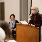 Helena Fagan speaks during the event, Family Stories  Juneau and the Holocaust, at the Mendenhall Valley Public Library Tuesday evening. Fagan shared two excerpts of a memoir she is writing about her mothers story of her narrow survival from the terrors of the Holocaust and Auschwitz concentration camp. (Clarise Larson / Juneau Empire)