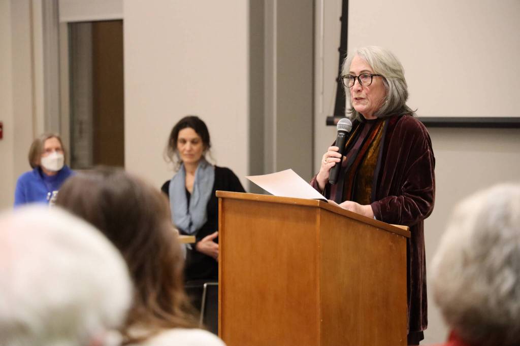 Helena Fagan speaks during the event, Family Stories  Juneau and the Holocaust, at the Mendenhall Valley Public Library Tuesday evening. Fagan shared two excerpts of a memoir she is writing about her mothers story of her narrow survival from the terrors of the Holocaust and Auschwitz concentration camp. (Clarise Larson / Juneau Empire)