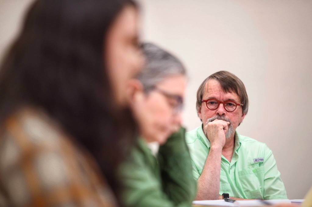 KTOO President and General Manager Bill Legere watches public testimony at the public radio stations board meeting in September of 2018. Current and former station employees expressed concerns about newsroom atmosphere and what they felt was unfair treatment by upper management. (Michael Penn / Juneau Empire File)
