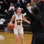 Freshman point guard Gwen Nizich scans the court during Wednesday nights game against Bettye Davis East Anchorage High School during the first night of the Princess Cruises Capital City Classic. (Clarise Larson / Juneau Empire)