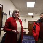 Clarise Larson / Juneau Empire 
State Rep. Sara Hannan talks with constituents outside her office in the Alaska State Capitol during the Juneau legislative delegations holiday open house Thursday afternoon.