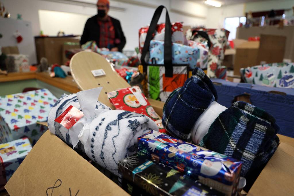 Gifts donated to St. Vincent de Paul for its annual Adopt-A-Family holiday program await pickup by Juneau residents on Thursday at the facilitys Teal Street complex. The organization, which got more than 300 requests for gifts from families, initially had to stop accepting them earlier this week due to demand exceeding donations. But during the past two days an infusion of gifts and donations have been made to the campaign, according to St. Vincents Executive Director Dave Ringle. (Clarise Larson / Juneau Empire)