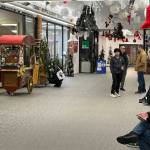 A line of people wait patiently for shops to officially open to get in some last minute shopping for the holidays at the Mendenhall Mall on Thursday. (Jonson Kuhn / Juneau Empire)
