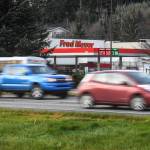 Traffic passes by Fred Meyer in Juneau in November 2019. Many Juneau residents may need  or at least want  to get their prescriptions somewhere other than Fred Meyer as of Jan. 1, since its parent company Kroger has announced the termination of an agreement with a pharmacy benefit manager that works with insurers such as Cigna and Premera Blue Cross Blue Shield of Alaska. (Michael Penn / Juneau Empire File)