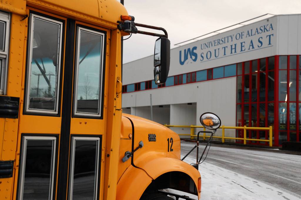 A school bus sits in the parking lot of the University of Southeast Alaska Tech Center downtown. In the fall of 2024, a new commercial drivers license education training program is expected to be offered at the campus. (Clarise Larson / Juneau Empire)