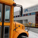 A school bus sits in the parking lot of the University of Southeast Alaska Tech Center downtown. In the fall of 2024, a new commercial drivers license education training program is expected to be offered at the campus. (Clarise Larson / Juneau Empire)