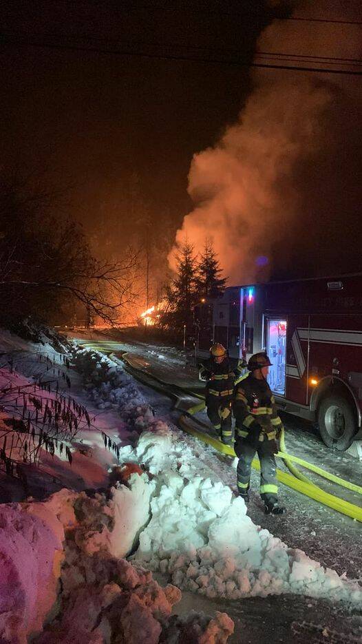 CCFR crews work to extinguish a trailer fire late Tuesday night on Glacier Highway across from Auke Lake. (Courtesy Photo / CCFR)
