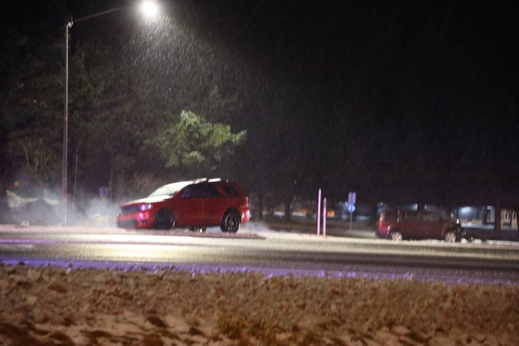 Two cars shown here after crashing on Monday night at the intersection of Egan Drive and the Fred Meyer access road. Minor injuries reported for one of the drivers while no injuries reported for the occupants of the other vehicle. (Clarise Larson / Juneau Empire)