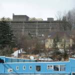 Juneau's Telephone Hill neighborhood is seen at center right, beneath the State Office Building, on Wednesday, Dec. 28, 2022. The neighborhood, owned by the state of Alaska, is being transferred to the City and Borough of Juneau. (James Brooks / Alaska Beacon)