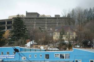 Juneaus Telephone Hill neighborhood is seen at center right, beneath the State Office Building, on Wednesday, Dec. 28, 2022. The neighborhood, owned by the state of Alaska, is being transferred to the City and Borough of Juneau. (James Brooks / Alaska Beacon)