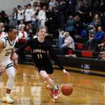 Junior guard Sean Oliver dribble to the net during the first quarter during Thursday nights game against South Anchorage High School during the first night of the Princess Cruises Capital City Classic. (Clarise Larson / Juneau Empire)