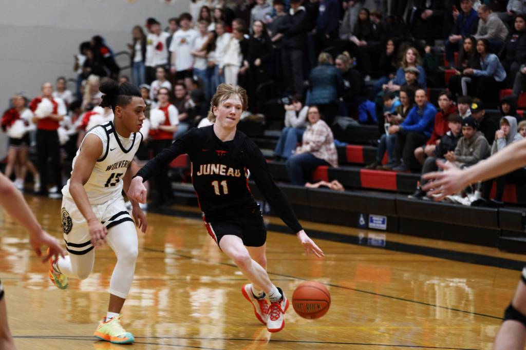 Junior guard Sean Oliver dribble to the net during the first quarter during Thursday nights game against South Anchorage High School during the first night of the Princess Cruises Capital City Classic. (Clarise Larson / Juneau Empire)