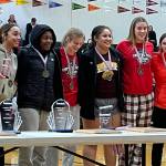 JDHS players Skylar Tuckwood, Mila Hargrave and Gwen Nizich each earned all-tournament honors for the Crimson Bears during the Capital City Classic awards ceremony. (Jonson Kuhn / Juneau Empire)
