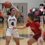 JDHS senior guard Kiyara Miller looks for an open teammate for a pass during the final game of the Capital City Classic tournament on Friday. (Jonson Kuhn / Juneau Empire)