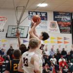 JDHS senior forward Orion Dybdahl comes in for a two-point shot during Fridays Capital City Classic against West Valley High School. Dybdahl would end the game with a total of eight points. (Jonson Kuhn / Juneau Empire)