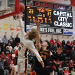 JDHS junior guard Sean Oliver scores a layup against West Valley High School on Friday during the conclusion of the Princess Cruises Capital City Classic tournament. The Crimson Bears girls team also played against Anchorage Christian School. (Jonson Kuhn / Juneau Empire)