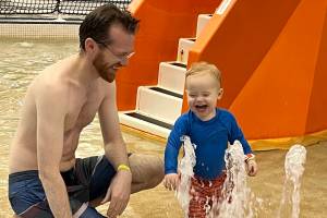 James Snookes plays with his son Harry in the pool at the Dimond Park Aquatic Center as part of the SAFE Child Advocacy Centers free sponsored event Family Day at the Pool. (Jonson Kuhn / Juneau Empire)