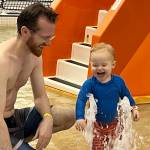 James Snookes plays with his son Harry in the pool at the Dimond Park Aquatic Center as part of the SAFE Child Advocacy Centers free sponsored event Family Day at the Pool. (Jonson Kuhn / Juneau Empire)