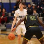 TMHS junior guard Samuel Lockhart surveys the court late in a home game against Service High School. Lockhart put up 14 points for the Falcons, including seven in the fourth quarter. (Ben Hohenstatt / Juneau Empire)