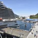 Cruise passengers walk near the docks in Juneau during the 2022 cruise ship season. Tourism-related industries and transportation had the highest rates of growth in Southeast Alaska last year as the region added 2,400 jobs instead of the 1,400 forecast in 2022, according to this months Alaska Economic Trends report. Seafood processing jobs saw the largest decline at 20%. (Peter Segall / Juneau Empire)