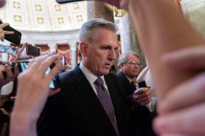 Rep. Kevin McCarthy, R-Calif., is surrounded by reporters as he walks to the House floor from the Speakers Office, Wednesday, Jan. 4, 2023, on Capitol Hill in Washington. (AP Photo / Jacquelyn Martin)