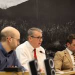 From left to right, City and Borough of Juneau Deputy City Manager Robert Barr, City Manager Rorie Watt and Finance Director Jeff Rogers discuss a package of proposals addressing recruiting and retaining city employees during the Wednesday evening Assembly Finance Committee meeting. (Clarise Larson / Juneau Empire)