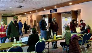 Juneau residents register for COVID-19 vaccinations at Centennial Hall in April of 2021. Bartlett Regional Hospital and other city-owned institutions provided virus tests and vaccinations in a multitude of locations during the pandemic, as well as providing at-home tests and coordinating with other entities such as the Alaska Native-owned SEARHC. (Bartlett Regional Hospital)