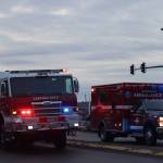 CCFR respond during a three car crash on Thursday at the intersection of Egan Drive and Vanderbilt. According to CCFR Assistant Chief Sam Russell, only one person was transported to the hospital with minor injuries. (Jonson Kuhn / Juneau Empire)