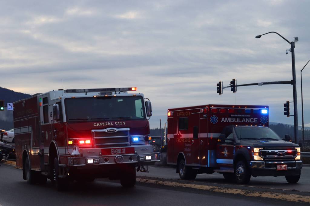 CCFR respond during a three car crash on Thursday at the intersection of Egan Drive and Vanderbilt. According to CCFR Assistant Chief Sam Russell, only one person was transported to the hospital with minor injuries. (Jonson Kuhn / Juneau Empire)