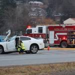A 2014 white Dodge Challenger, seen here, was cited by JPD for failure to exercise due care which resulted in a three car crash on Thursday afternoon at the intersection of Vanderbilt and Egan Drive. (Jonson Kuhn / Juneau Empire)