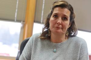 Shawnda OBrien, the just-departed state Director of the Division of Public Assistance, talks Dec. 27 about the problems that are resulting in months-long backlogs in processing applications for benefits commonly referred to as food stamps. Her departure as director was announced Monday following weeks of widespread media coverage about the backlog that is expected to take additional months to resolve. (Mark Sabbatini / Juneau Empire)