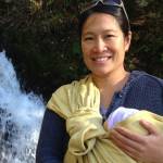 Lisa Phu holds her daughter, Acacia, near a waterfall on a trail just south of Thane in October of 2016.(Courtesy of Lisa Phu)