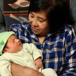 Lan Phu holds her granddaughter, Acacia, at Lisa Phus home in Juneau in October of 2016. (Courtesy of Lisa Phu)